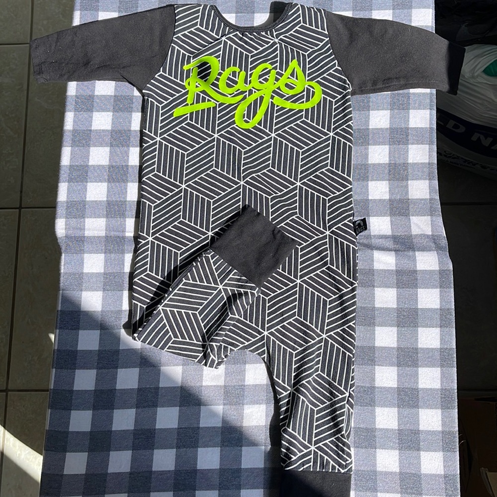 Rags to Raches romper